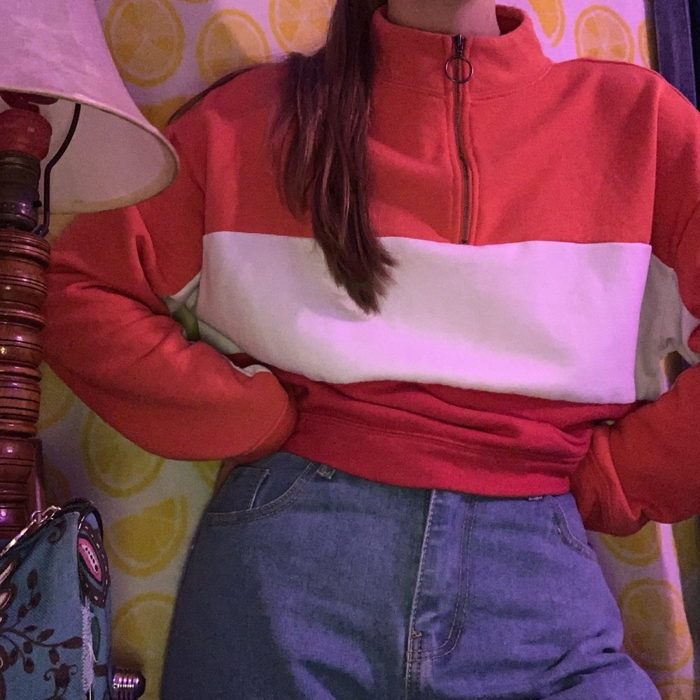 cropped orange turtleneck sweater